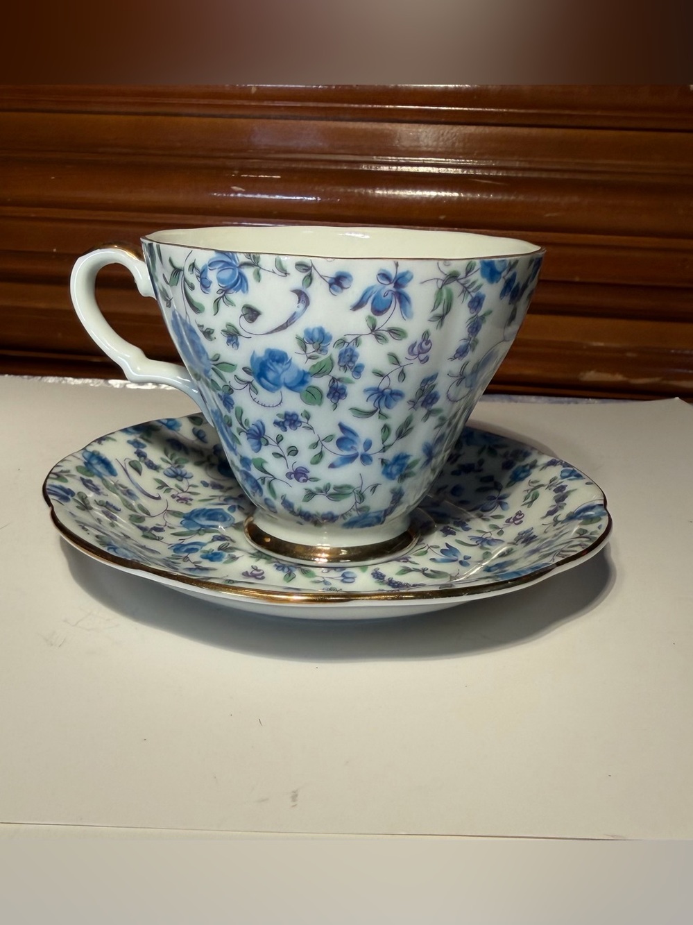 Lefton China Tea Cup and Saucer Hand-painted Blue Rose Pattern Gold Trim